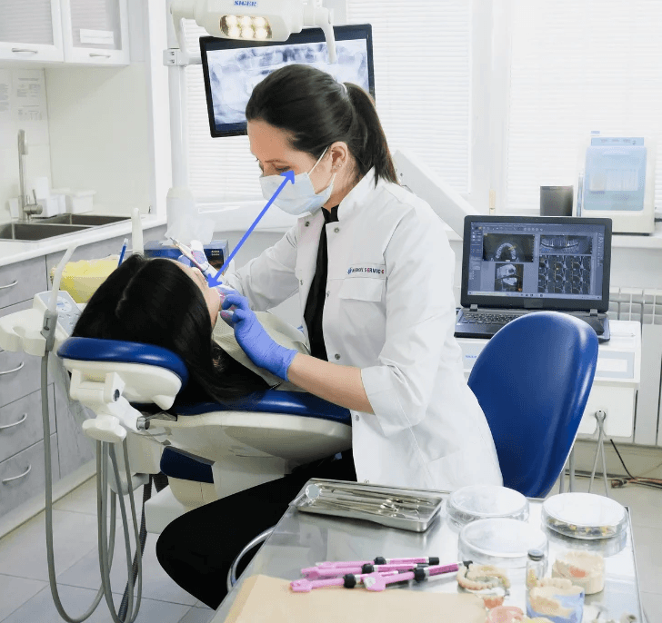 Clinician demonstrating natural working distance posture during a procedure